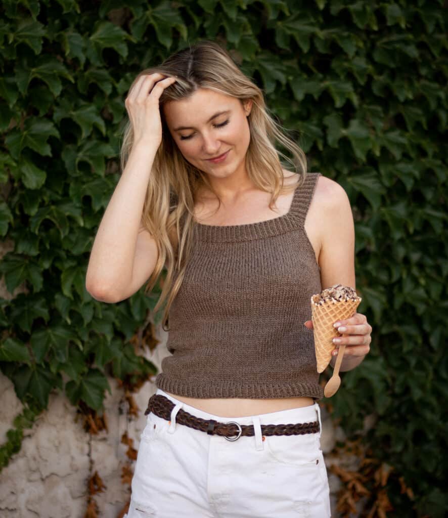 Square neck knit tank top being worn by model holding an ice cream cone