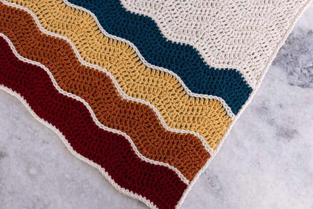 Wavy baby Blanket wave stripe detailing shown close up