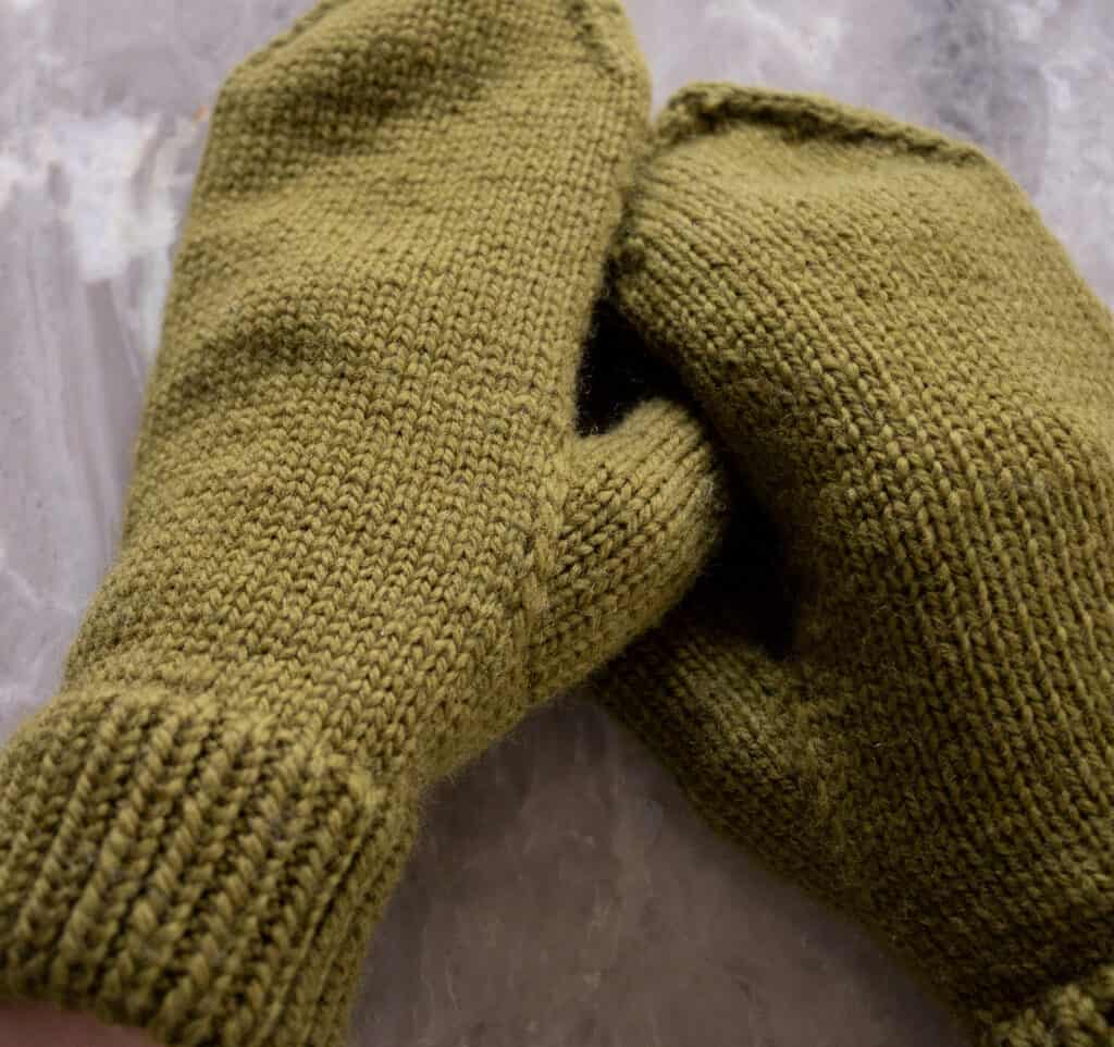 Close up detail image of the Vanilla Mittens, showcasing the slipped stitch increases and the foldover cuff